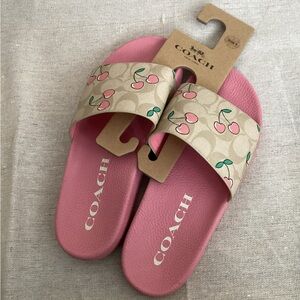 Sold out online, Coach cherry slides, size 9